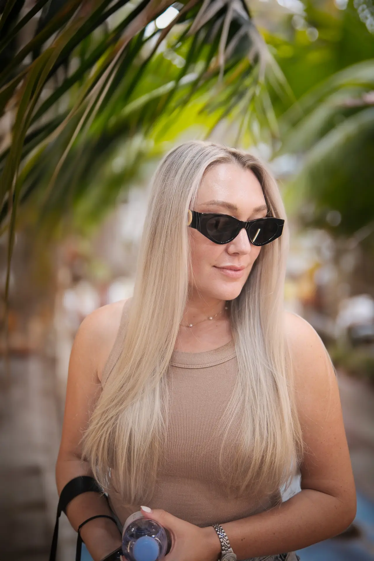 Glossy straight hair after keratin treatment at high-end Miami hair salon