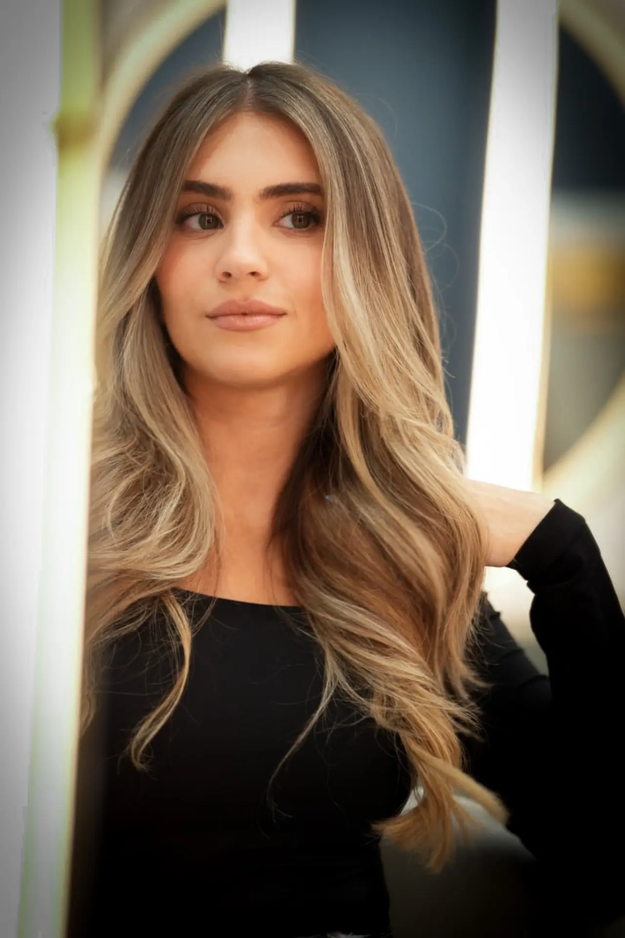 Straight, shiny hair after deep conditioning treatment in Miami salon