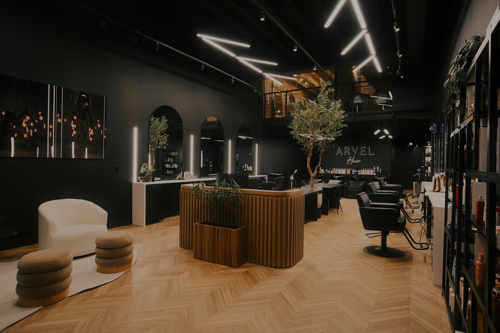 Salon interior with reception desk at Arvel Hair in Little River, Miami